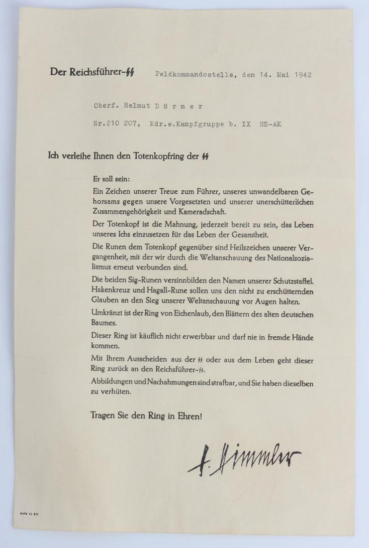 WWII GERMAN REICH HONOR RING AWARD CITATION PAPER: "H. Himmler" hand signed at bottom right corner. Official Reichsfuhrer-SS letter head at top left. Addressed to an "Oberf. Helmut Dorner" on "14 Mai 1942". One fold in document about 1/3 of the way do