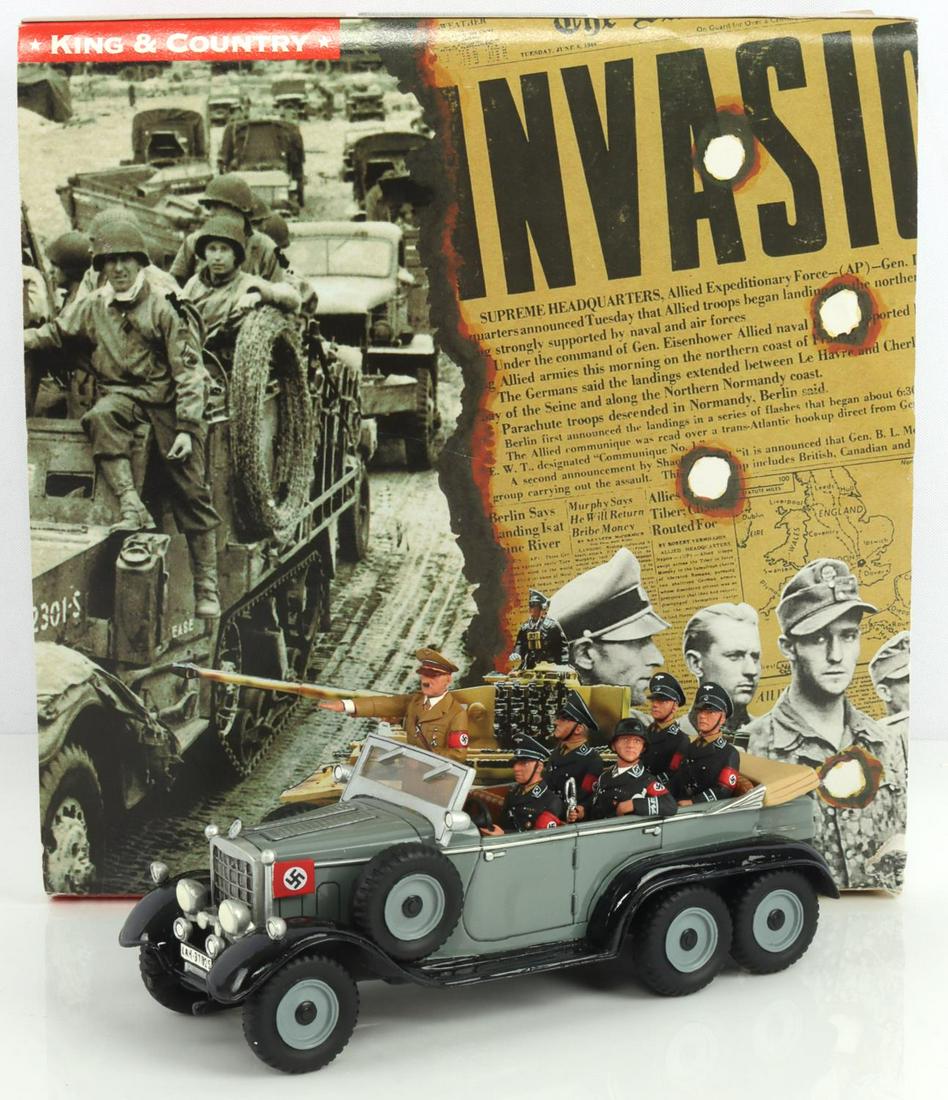 RETIRED KING AND COUNTRY HITLER STAFF CAR: Hitler staff car. This six-wheel Mercedes contains a standing saluting Hitler, his SS chauffeur, a seated SS adjutant, and 3 seated SS bodyguards. Measures 2 - 7 inches.