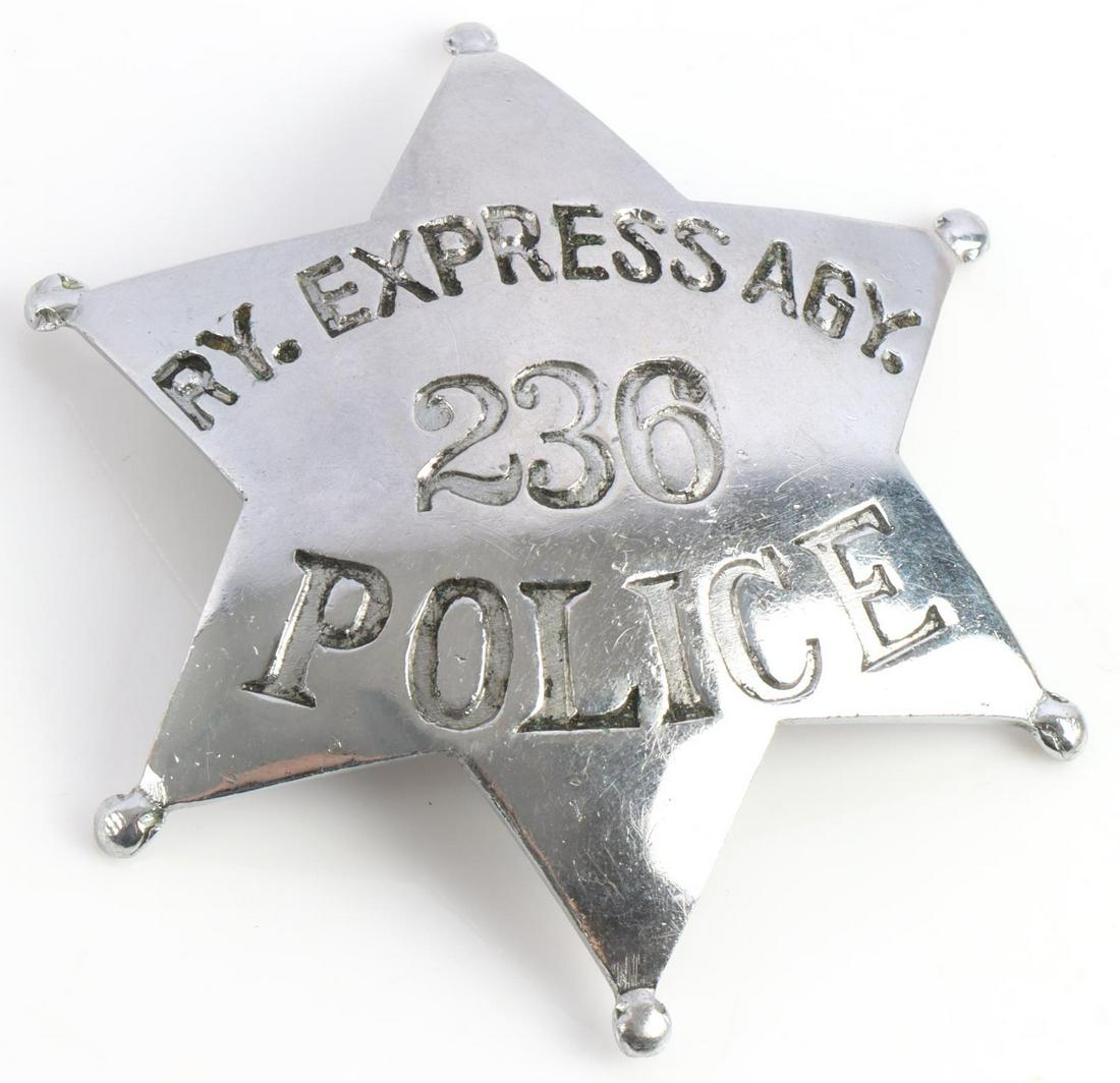 OBSOLETE POLICE BADGE RY. EXPRESS AGY 236: 6 star pinback, no makers stamp but oddly hand etched 376 Bryant SF Cal. A quick look shows a non descript building. Badge measures 3x3 inches.