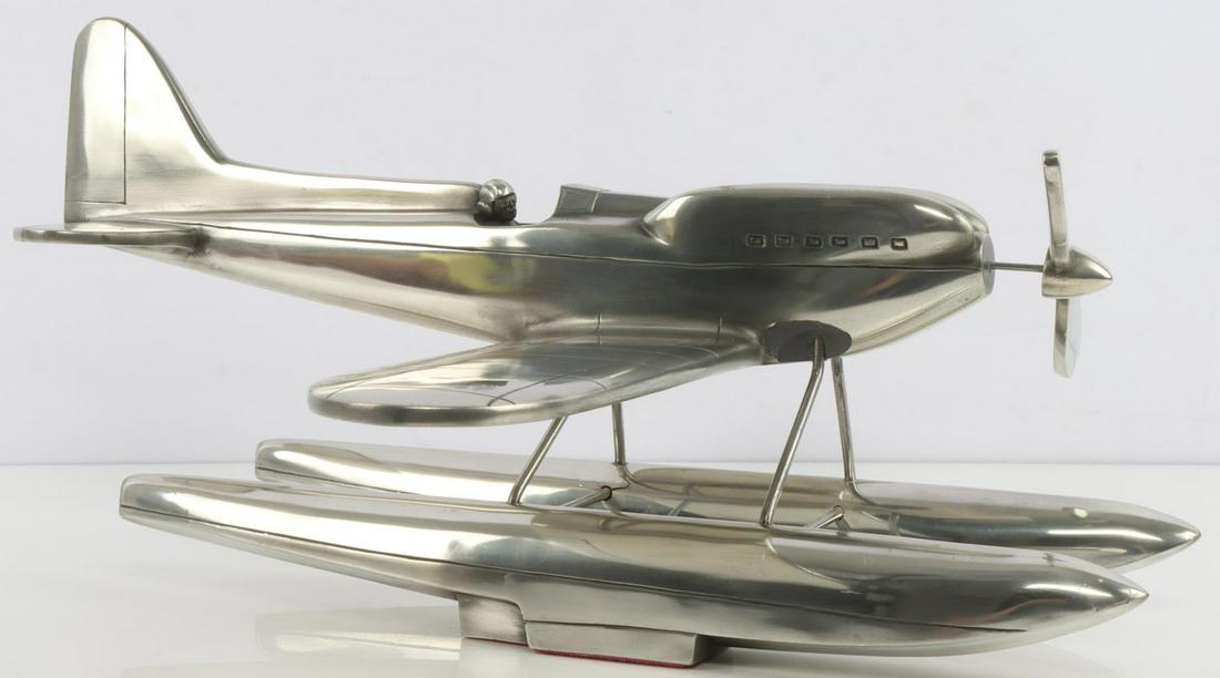 1929 S-6 SUPERMARINE SEAPLANE FLOAT PONTOON MODEL: Stainless steel desktop model. Has a super nice art deco shine. Measures 15x18x7 inches. Striking piece.