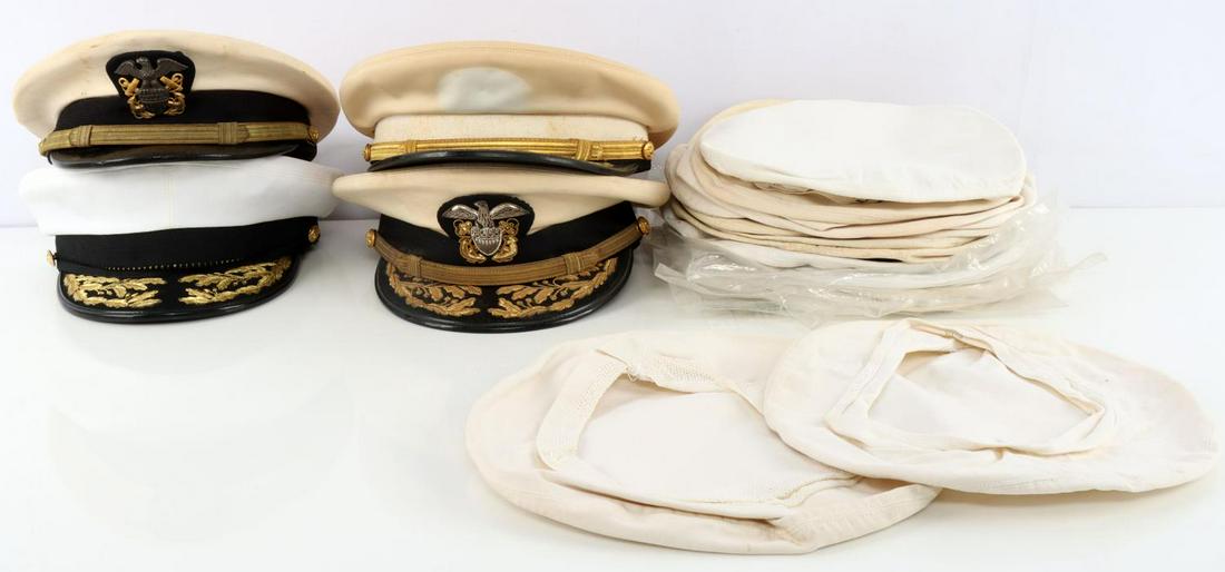 WWII POST WAR OFFICER NAVAL CAPS & CAP COVERS: 19 cap covers and 4 naval officer caps. Caps all have tailor tags and are in good condition with bullion eagles or bullion designs on visor.