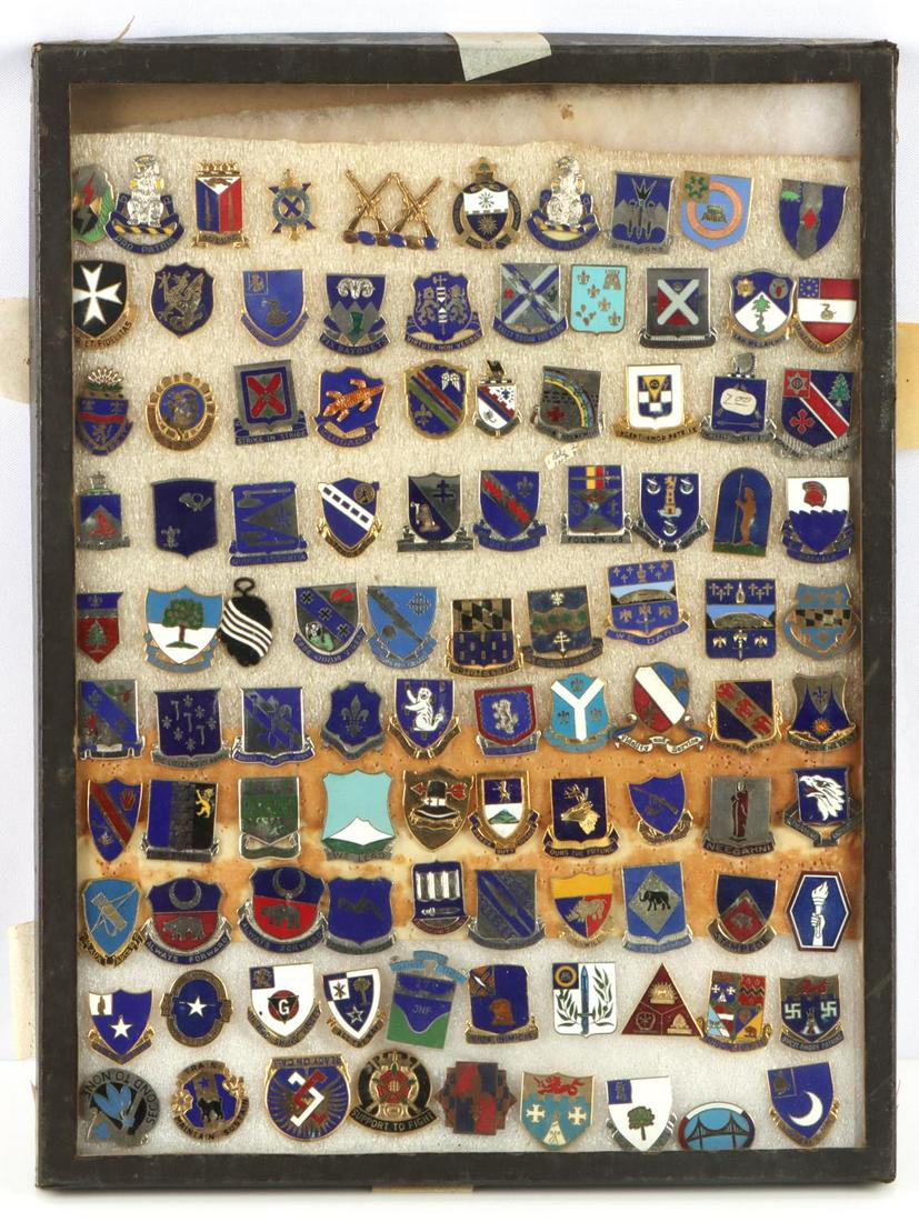 99 POST WAR ARMY INFANTRY DISTINCTIVE UNIT DUI LOT: Lot of 99 various US military post war to current distinctive unit insignias (DUIs). Includes army infantry regiments, army reserves, armored infantry divisions, support battalions, and more. Badges c