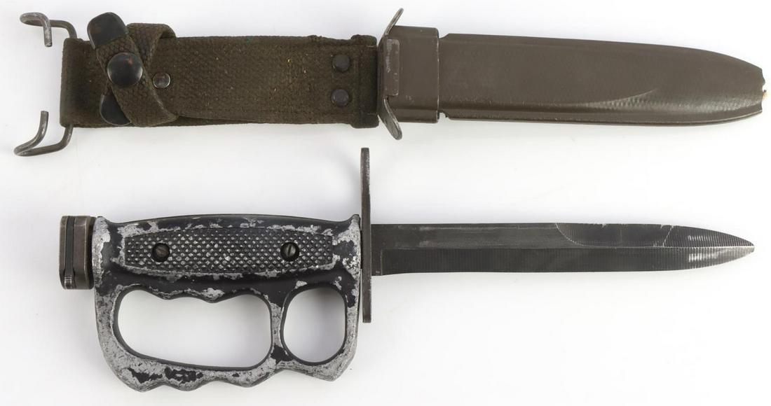 VIETNAM M7 KNUCKLE DUSTER KNIFE IN M8 SCABBARD: US M7 BOC marked on crossguard. USM8A1 B.M. Co. marked on scabbard. Measures 11 7/8 inches. Very good condition.
