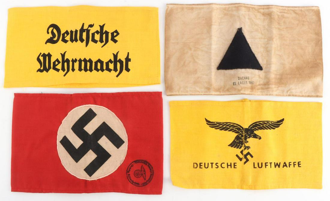 WWII GERMAN THIRD REICH ARMBAND LOT OF 4 DACHAU: Lot features armbands for Dachau, NSDAP, Luftwaffe, and Wehrmacht. Post war examples. Measures 8 1/4 inches. Very good condition.