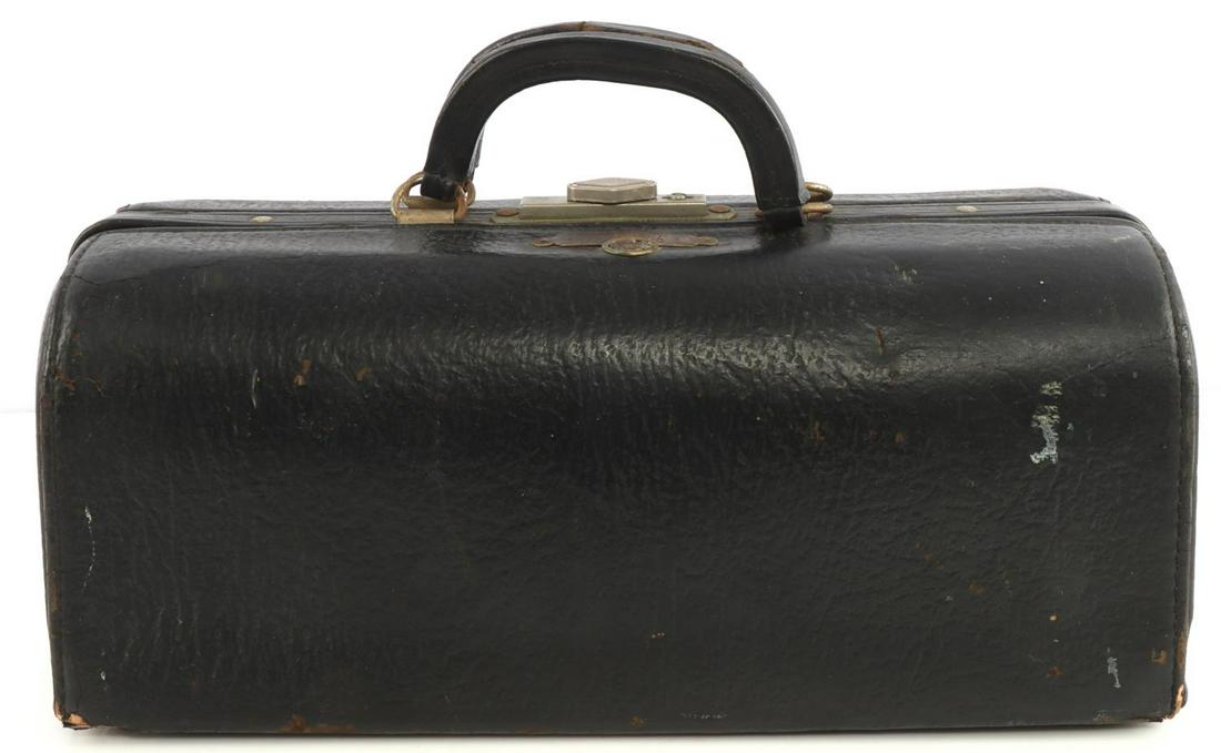 WWII GERMAN SS JOSEPH MENGELE MARKED BRIEF CASE: "Diagnostic" by Schell, a company that was based in Cincinatti and produced many briefcases throughout the 30's and 40's. Metal tag on outside of briefcase is marked "J. Mengele" with a swastika. Brie