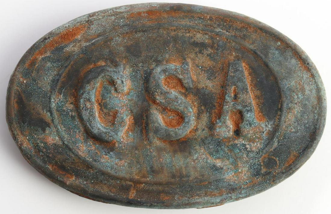 US CIVIL WAR CSA OVAL CARTRIDGE BELT PLATE: United States Civil War Confederate States of America cartridge belt plate. Brass non-magnetic oval plate featuring CSA to the front with puppy paw hooks. Very good excavated condition and measures 3x