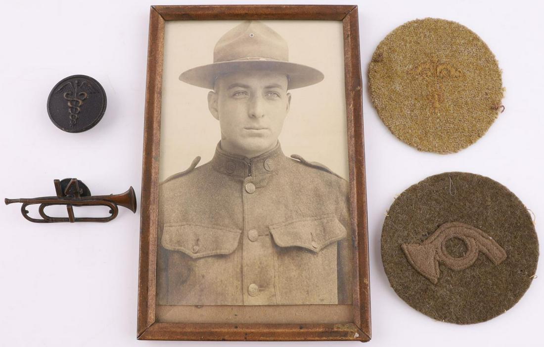 US WWI MEDIC PATCH COLLAR DISC AND BUGLER PATCH: Lot of 5 features a photo of PVT. William R. Roberts with his medic patch and collar tab. Also included is a rare wool bugler patch and pin. Measurements range 1 - 5 5/8 inches.