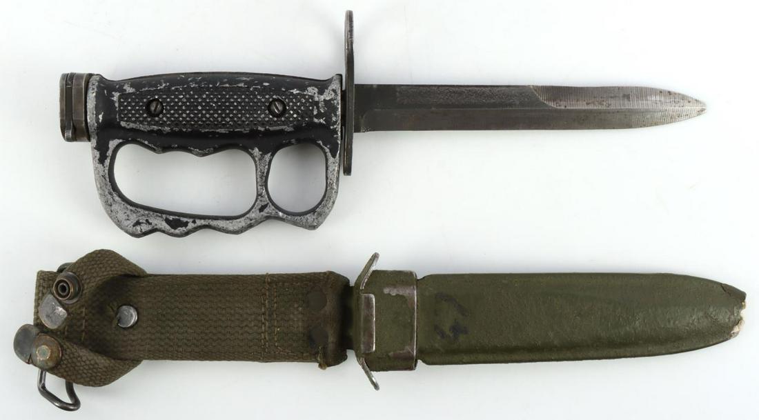 VIETNAM M7 KNUCKLEDUSTER M7 FIGHTING KNIFE BAYONET: Experimental fighting knife was a BOC maker and some paint loss. Remains in very good condition. Has an overall length of 12 inches. M8 scabbard has loss to chafe.