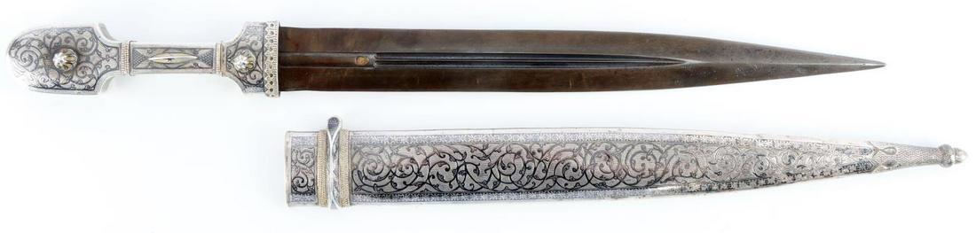 CAUCASIAN KINJAL GOLD INLAY AND NIELLO DAGGER: Steel blade with inlaid fuller. Grip and scabbard are both niello with gold inlay. Very good condition for age. Blade is dark and scabbard has some denting. Scabbard is also bright but has some spots