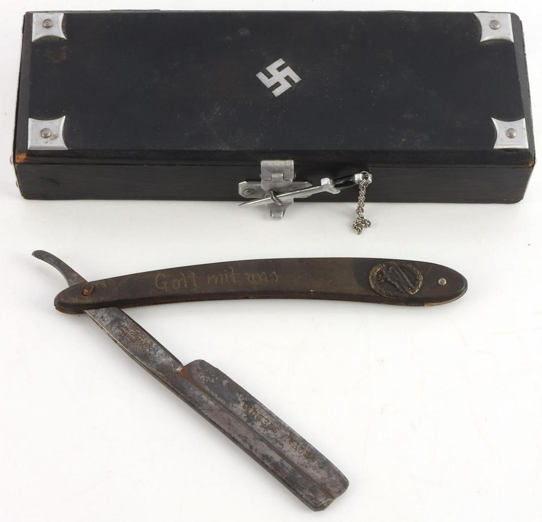 WWII GERMAN REICH FALLSCHIRMJAGER STRAIGHT RAZOR: Handle carved "Gott mit Uns" with Fallschirmjager badge at the bottom, . French made, marked "Royal Suedois" on blade. In black case with swastikas.