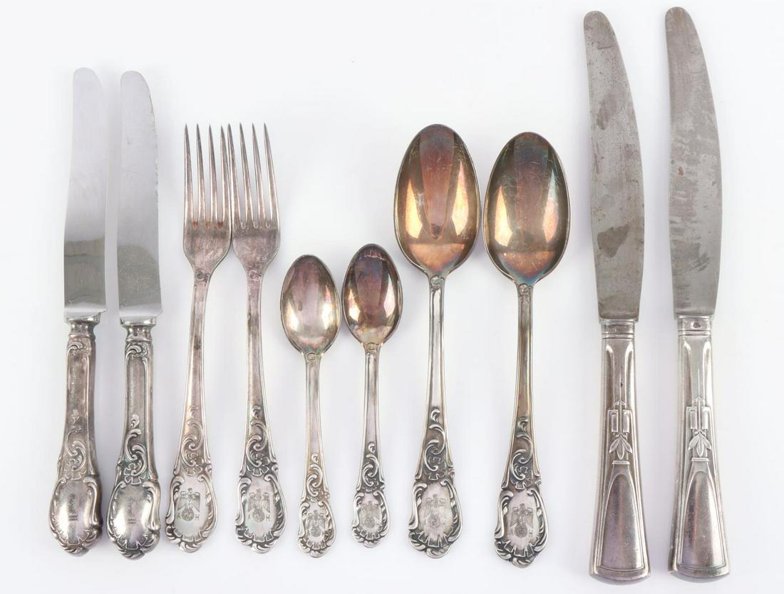 WWII GERMAN REICH AH HITLER FLATWARE SOLINGEN SET: Includes four spoons, two forks, and four butter knives. All but the large butter knives are marked "Genf II" on bottom with proof marks.