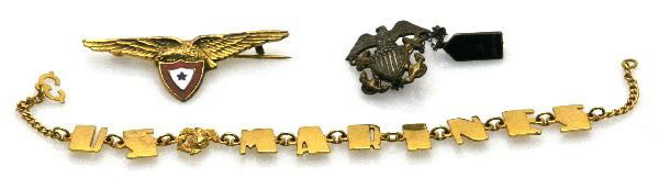 WWI WWII GOLD USMC SWEETHEART BRACELET & BADGES: Weighing 6 grams of 10K solid gold a EGA U.S. Marines sweetheart bracelet, WWI son in air service enameled brooch, and a sterling Ensign son in service pin.