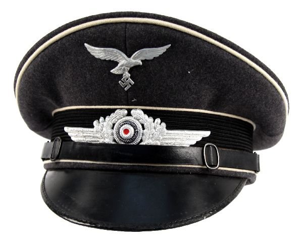 LUFTWAFFE HERMANN GORING DIV. ENLISTED VISOR CAP: WWII German Luftwaffe Hermann Goring division enlisted men's visor cap. Size 54 marked Erstklassig. Very good condition.