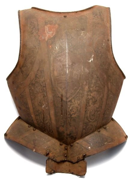 VICTORIAN ERA DECORATIVE BREASTPLATE: Victorian era decorative breastplate. Features etched relief and display mount. Measures 21 by 21 inches. Rusting and patina, overall in very good condition. Possibly could be cleaned.