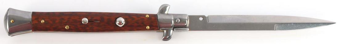 FRANK BELTRAME ITALY SWITCHBLADE STELETTO KNIFE: Wood grip, as new, measures opened 11 inches. Frank B Italy stamped blade.