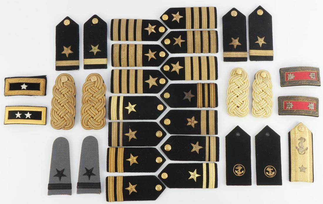 ENSIGN ADMIRAL COLONEL GENERAL SHOULDER BOARD LOT: Includes 13 full sets and 5 singles ranging from WWII to Vietnam. The Admiral and Generals are singles. Also includes a set of USMMA boards, as photographed