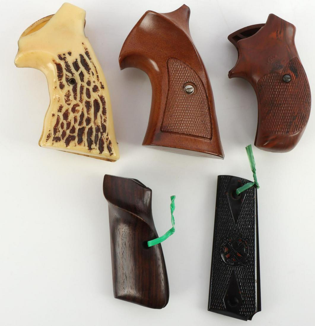 MISC LOT OF 1911 & REVOVLER GRIPS WOOD: 4 revolver grips, one 1911 grip.
