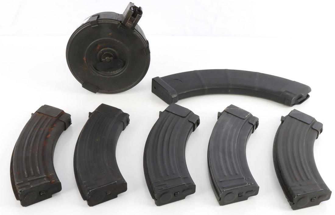 LOT OF SEVEN 7.62X39 BANANA AND DRUM MAGAZINES: 5 are the same with one magazine being longer.