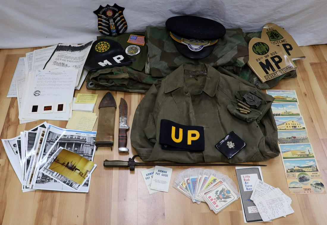 GERMAN RAIN COVER AND US EPHEMERA LOT: Lot features Captain Gary C. Kleinsmith service records and military rocket and nuclear training documents and debriefings. Also included are German military rain covers in splintered camo. Very good 