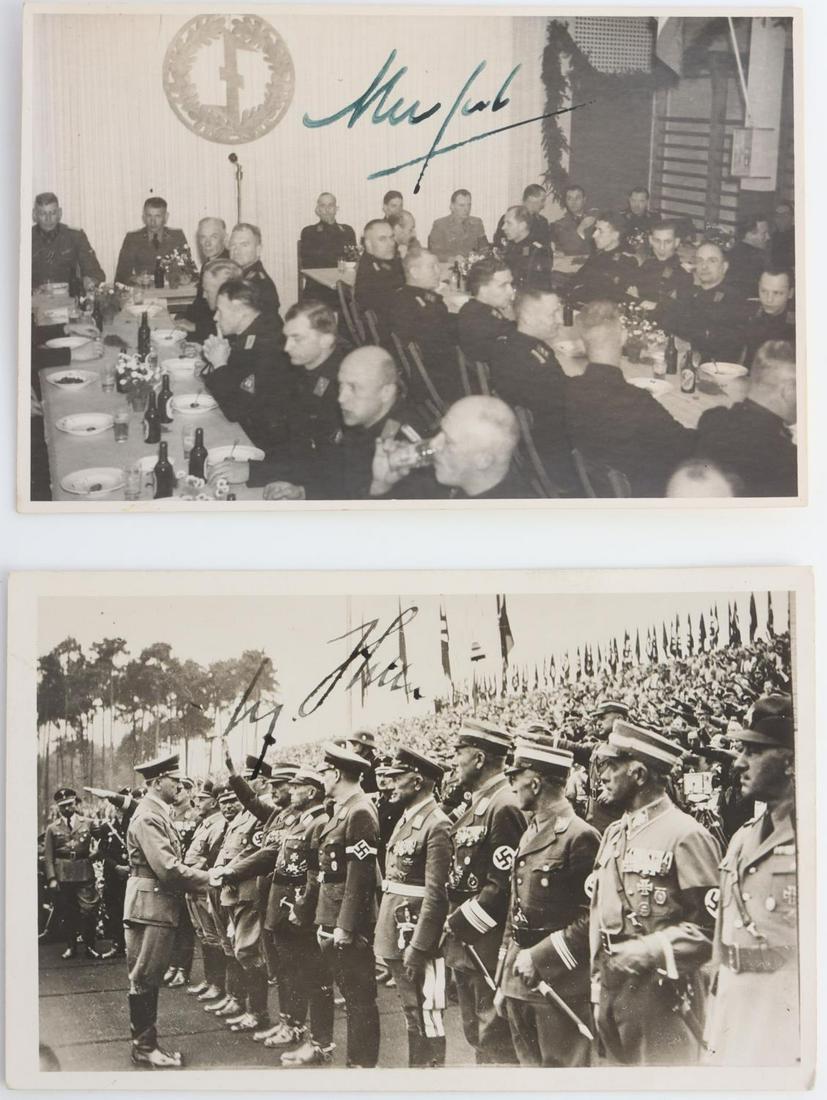 LOT OF 2 WWII GERMAN HITLER & MUSSERT SIGNATURES: Two (2) signed photos by Adolf Hitler and Anton Mussert. Both in pen and feature age. They measure 5 3/8 inches.