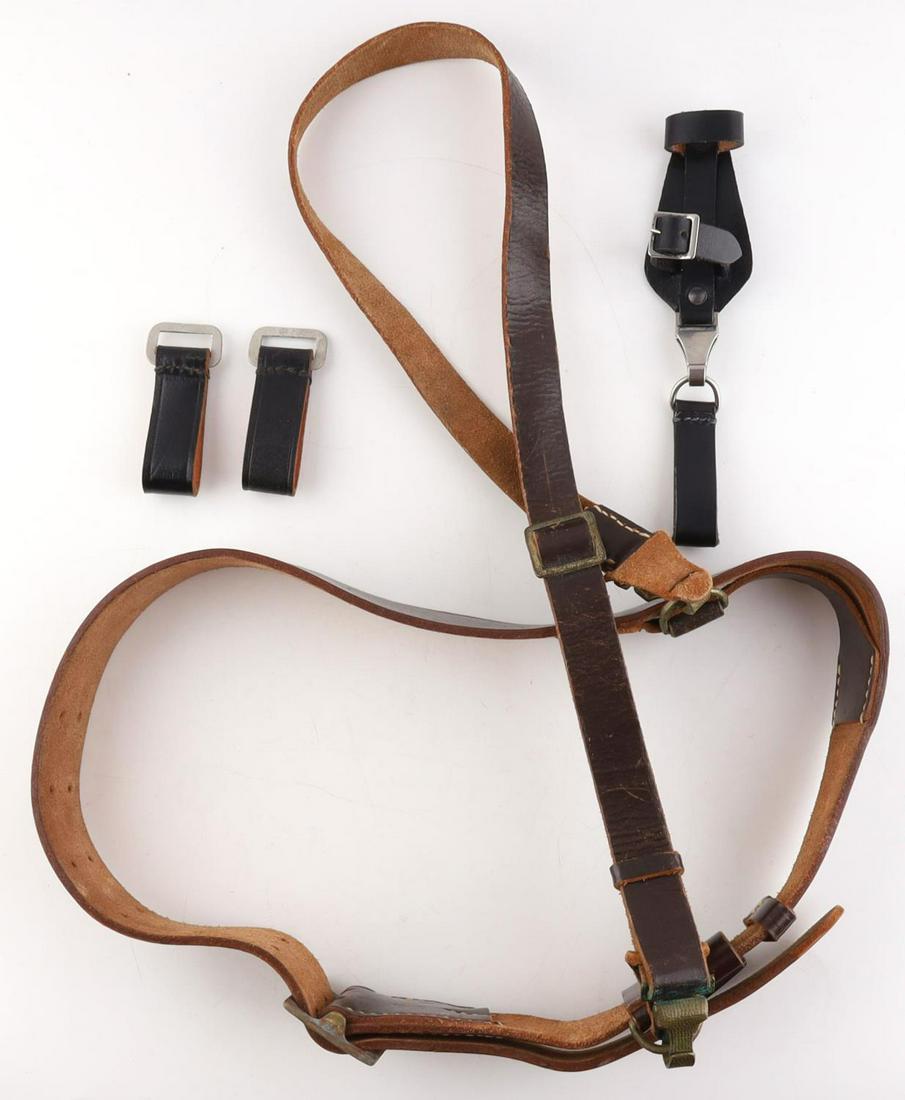 4 WWII GERMAN NSDAP LEADER BELT & CROSS STRAP LOT: Lot of four (4) WWII German Reich leather belt and straps. Leather belt and cross strap have inside marking for NSDAP and RZM. Lot includes two belt strap loops and lastly a dagger frog. Frog has NSDA
