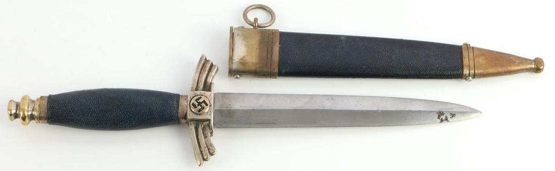 WWII GERMAN THIRD REICH DLV / NSFK FLYER'S DAGGER: WWII German Third Reich DLV / NSFK flyer's dagger with scabbard. Makers mark "F. & A Helbig Teinback KR. M" on ricasso of blade. Blue leather covering to the grip and the scabbard. Blade measures 6 3/
