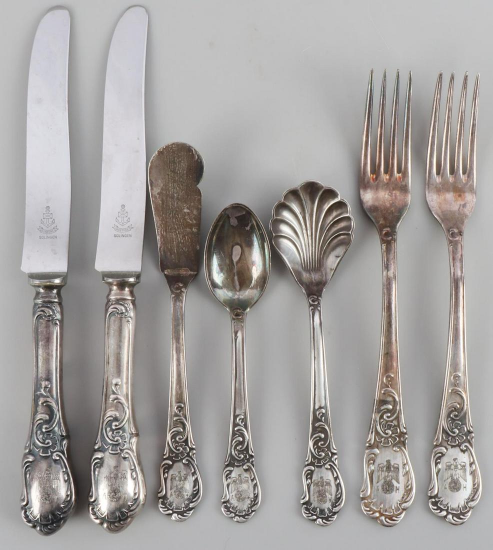 7 WWII GERMAN ADOLF HITLER SILVERWARE: Seven WWII German Adolf Hitler silverware pieces. Two dinner knives, two dinner forks, one butter knife, one coffee spoon, and one sugar spoon. All pieces feature the Reichsadler with AH to the end of