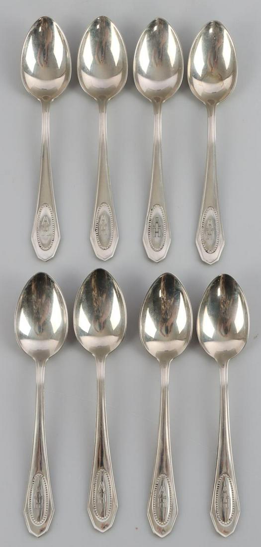 8 WWII GERMAN ADOLF HITLER SPOONS SILVERWARE: Eight WWII German Adolf Hitler spoons. Handles marked AH with maker marked to reverse handle. Very good condition. 5 1/4 inches. Unauthenticated sold as is.
