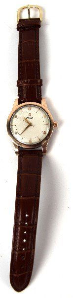 OMEGA AUTOMATIC GOLD FILLED MENS VINTAGE WATCH: Vintage Men's gold filled Omega automatic dress watch, faux crocodile band, has not been recently serviced, bust is currently keeping good time and working, buyer should expect to have watch serviced.