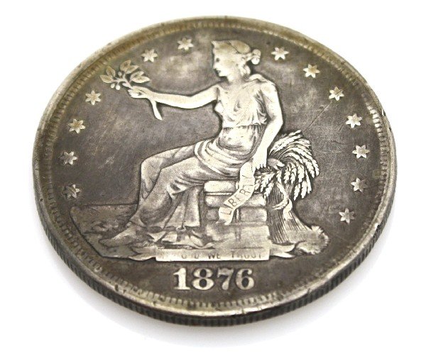 1876S TRADE SILVER DOLLAR CONVERTED SNUFF BOX: Silver 1876-S trade dollar , interestingly cut and hinged into either a snuff container or perhaps a Pox patch holder.
