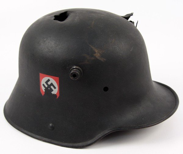 GERMAN M16 HELMET WWII PAINT & DECAL BULLET HOLE: German M-16 helmet, with two shrapnel / bullet holes. Appears repainted, with WWII Third Reich shield decal. No liner.