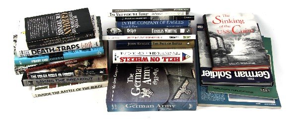 LARGE GROUPING OF MILITARY BOOKS: Large group of Military books including "The German Solider", "Inside the Battle of the Bulge", "The face of Battle", "In the Company of Eagles" (signed), "Hell on Wheels", "Death Traps", and many mor