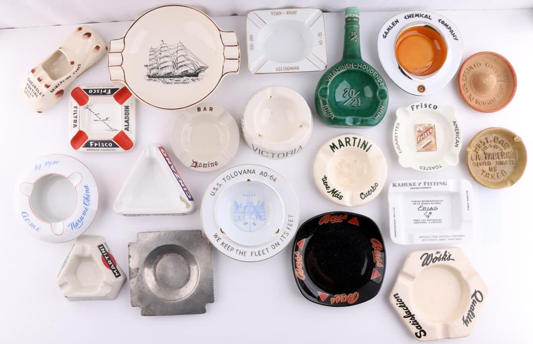 20 1950'S ADVERTISING ASHTRAY LOT PRIVATE & USN: Some quite scarce, Tin Can Sailor in 1950's collected, bars, Naval vessels, tires and hotels, no duplicates.