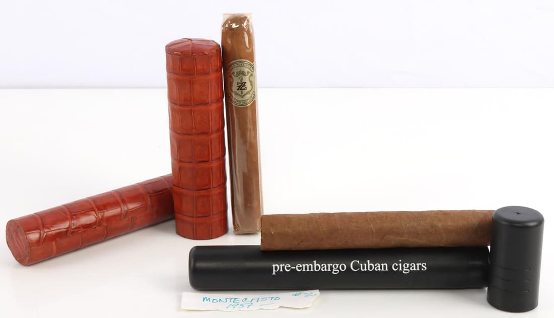 PRE EMBARGO CUBAN MONTECRISTO & ZINO CIGAR LOT: Former stock of the Vendetta Cigar room located in the Fairmont Hotel San Francisco, in its tube tagged 1957 Montecristo #2 cigar, the second in a Caiman Skin custom tube retail priced at $340.00, ins