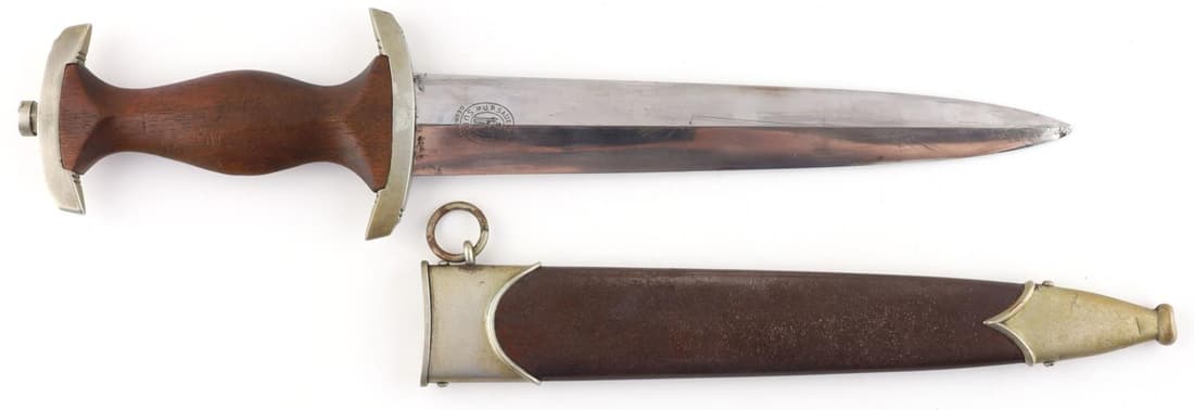 WWII GERMAN REICH EARLY SA DAGGER J.P. SAUER: "J.P. Sauer & Sohn" maker's mark on blade above marking "GEGR1754". "FR" SA Gruppen marking on upper crossguard. Eagle is not completely flush, tips of the wings poke out just a bit. Tang is good, wit
