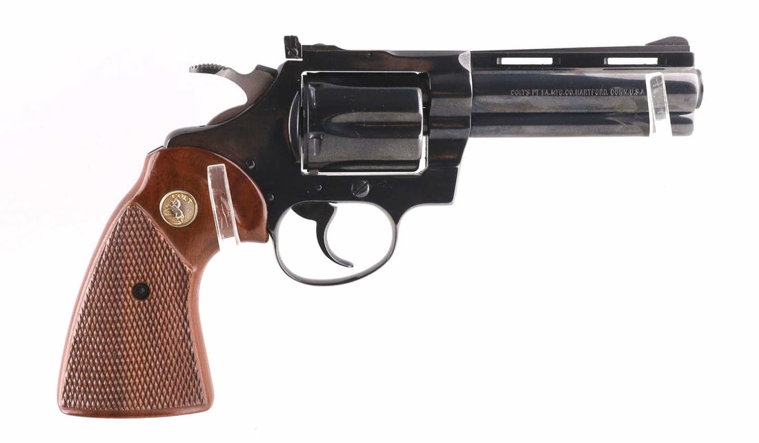 COLT SNAKE SERIES DIAMONDBACK 22 LR REVOLVER: Blued finish. Wooden grips. Manufactured in 1978. Barrel measures 3 7/8 inches. Bore is bright and clear. Very good condition overall. FFL required for transfer. No international shipping. Know your s