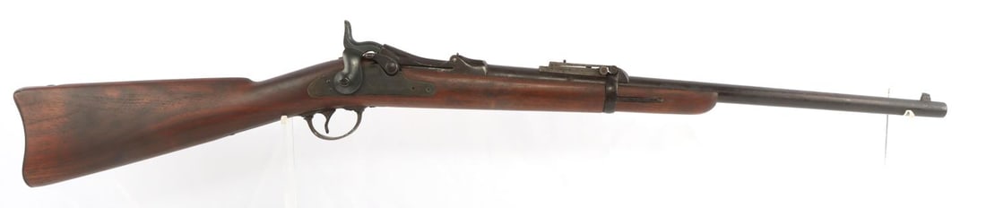 U.S. SPRINGFIELD MODEL 1884 45-70 TRAPDOOR CARBINE: A U.S. Springfield Model 1884, .45-70 caliber, single-shot trapdoor carbine rifle. Breach block stamped U.S. Model 1884. Serial #414861. Pop up sight. Right side plate stamped U.S. Springfield with ea