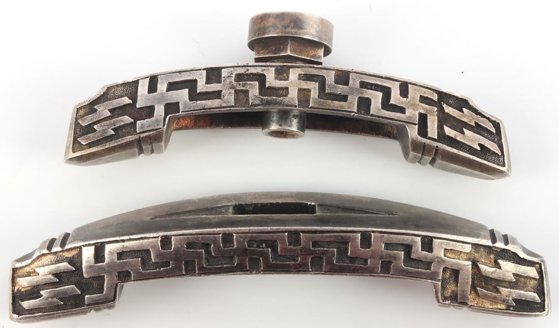 WWII SS HONOR DAGGER SILVER NICKEL CROSSGUARDS: German crossguards for an SS honor dagger. Interior is marked with an H and a difficult to discern maker's mark. They measure 2 7/8 X 5/8 inches and 2 3/8 X 1/2 inches. Very good condition with toning