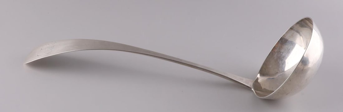 ANTIQUE SILVERSMITH C. MOORE SILVER LADLE: Monogrammed. C. Moore marked. Weighs 175.1 grams. Measures 12 1/2 inches. Possibly coin silver. Very good condition. This lot has a reserve.