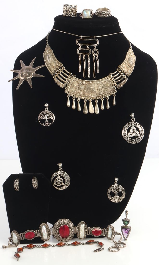 VINTAGE STERLING SILVER AND GEMSTONE JEWELRY: All sterling silver jewelry including necklaces, earrings, pendants, rings and bracelets. Some with raw rubies, amber and pearl accents . Condition: wear or resale. Total weight 179 grams This lot has