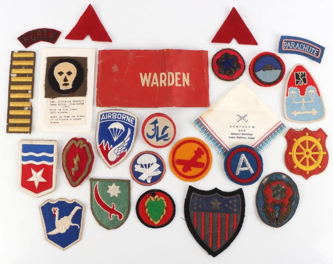 31 WWII UNITED STATES ARMY CORPS SHOULDER PATCHES: Lot of thirty-one (31) various WWII United States Army Corps and Divisions shoulder patches including two 3rd Army patches, a 2nd Division Rangers patch, a parachute patch, a 25th Infantry patch, 158t
