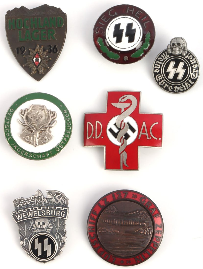 7 WWII GERMAN REICH ENAMELED DDAC & SS BADGE LOT: Lot of seven (7) various WWII German Reich enameled badges including a D.D.A.C badge, a Nazi Hunting Society badge, a SS Sieg Heil badge, a Zeppelin badge, an SS Wewelsburg Academy badge, an SS Totenk