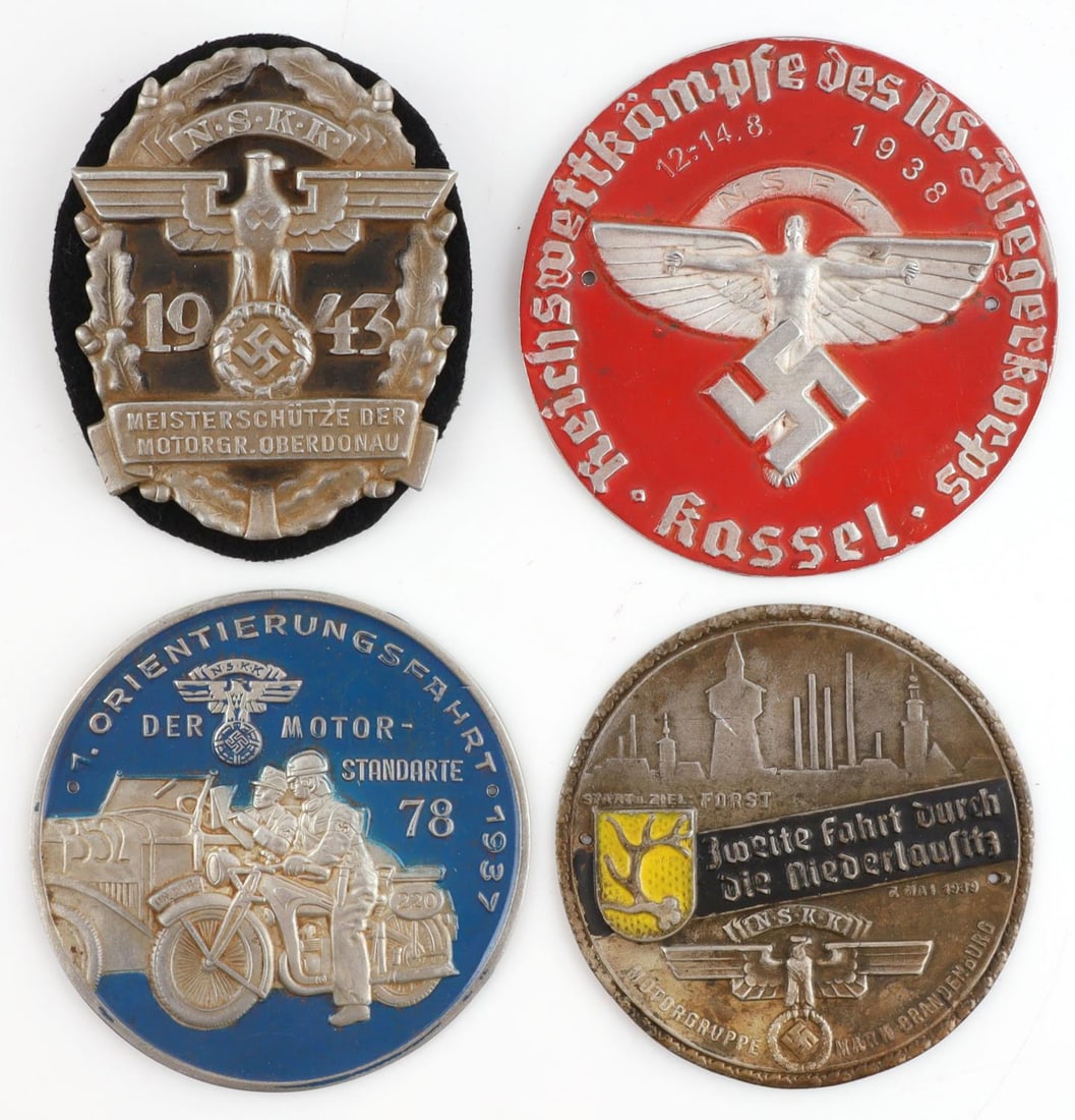 WWII GERMAN THIRD REICH NSKK SLEEVE SHIELD LOT 4: WWII German Third Reich NSKK Sleeve 4 NSKK and NSFK shields. All are in very good condition. Measure 2 - 3 1/4 inches.