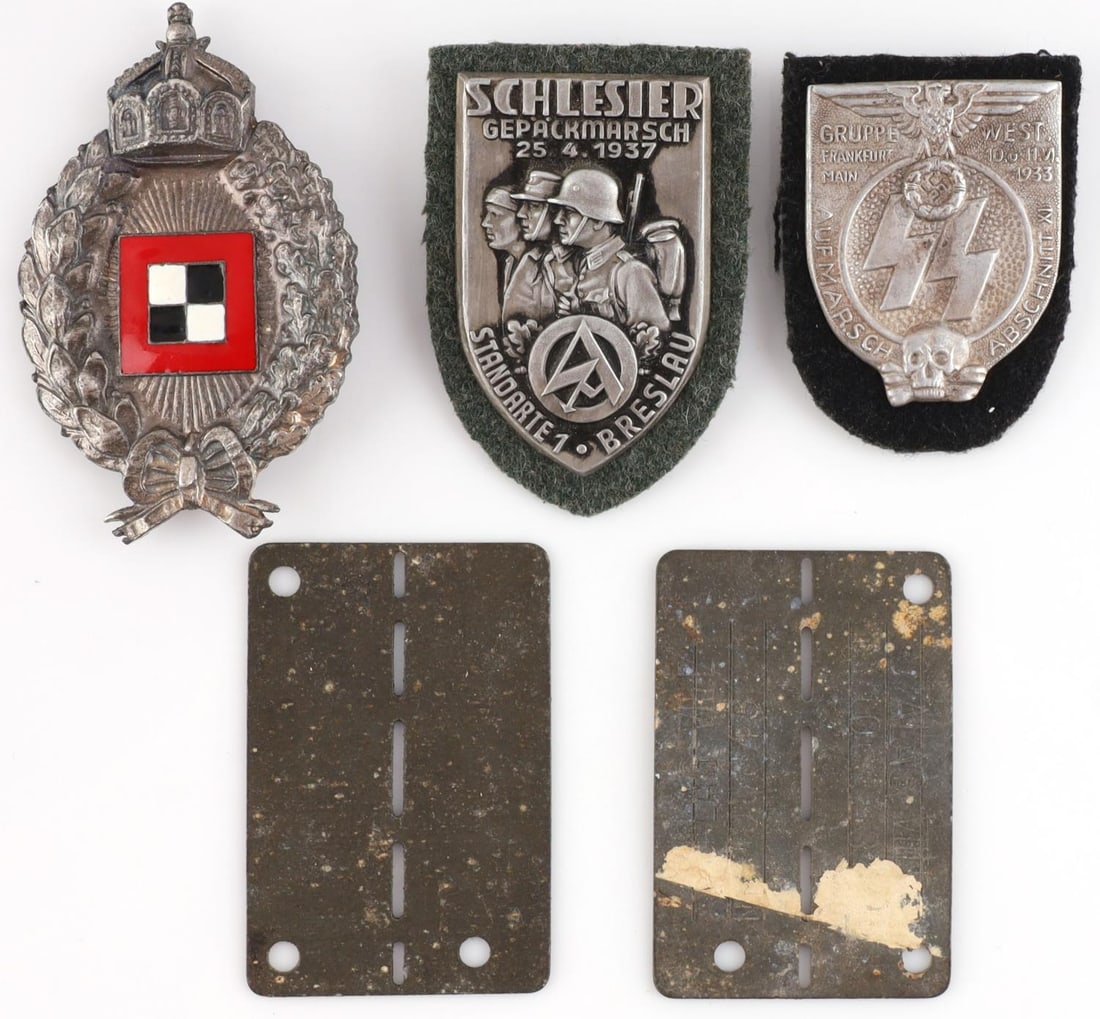 LOT OF 5 WWII GERMAN THRID REICH MEDALS: Lot of 5 WWII German Third Reich medals. WWII German POW camp VIII E Stalag VIII E Prison camp dog tags. Prisoner #100766 both in good condition. Size 2 1/4 X 1 1/2 inches. WWI Prussian Pilots Badge i