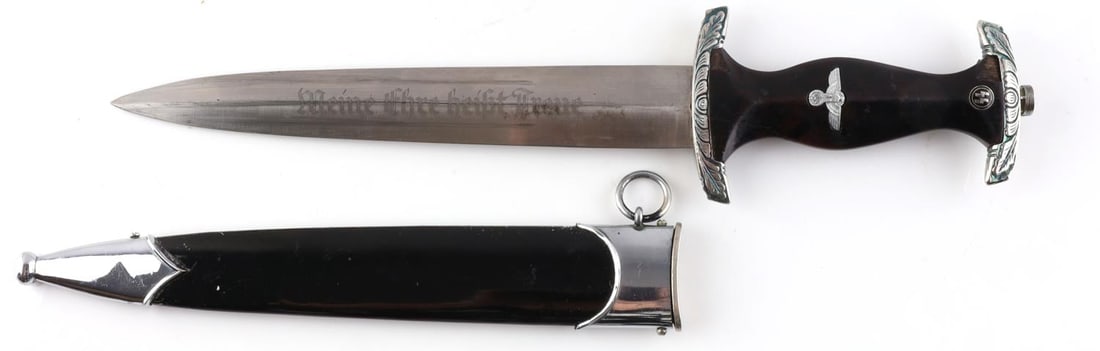 WWII GERMAN SS HONOR DAGGER W HIMMLER INSCRIPTION: Steel blade with etched motto and Himmler inscription. SS 120/34 RZM. Stylized crossguards and ebony grip. Housed in painted scabbard. Measures 14 5/8 inches. Very good condition. Unauthenticated, sol