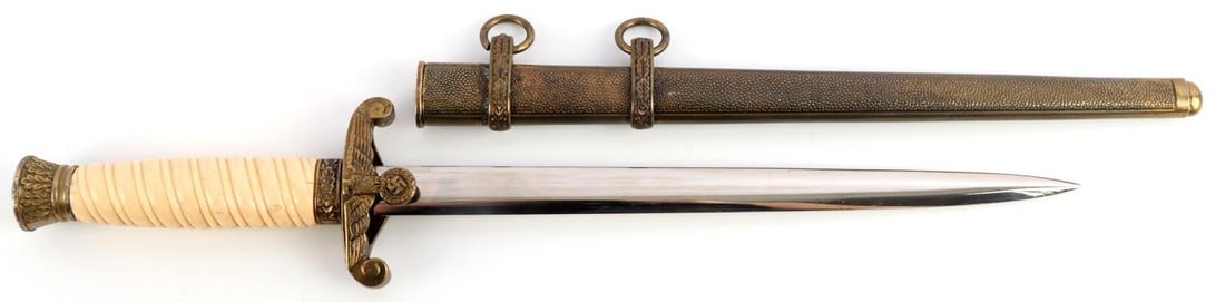 WWII GERMAN REICH ARMY OFFICER'S DAGGER W SCABBARD: WWII German Reich Army Officer's dagger with scabbard by F.W. Holler Berlin. Makers mark on ricasso of the blade. Grip has crack starting from the bottom of the crossguard. Blade is approx. 9 3/4 inch