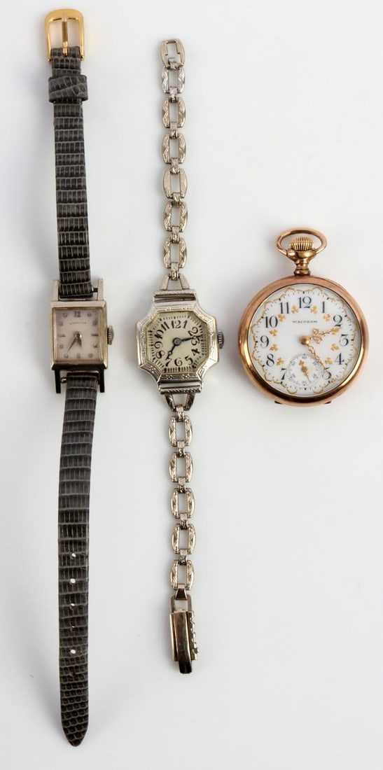 14KT LADIES VINTAGE WRIST & G.F. POCKET WATCH LOT: Lot of 3 timepieces includes: One circa 1920'-1940's P. Vermot mechanical Swiss wrist watch with 14kt white gold case. One Hamilton Mid Century small tank watch with 14kt white gold case and gray liza