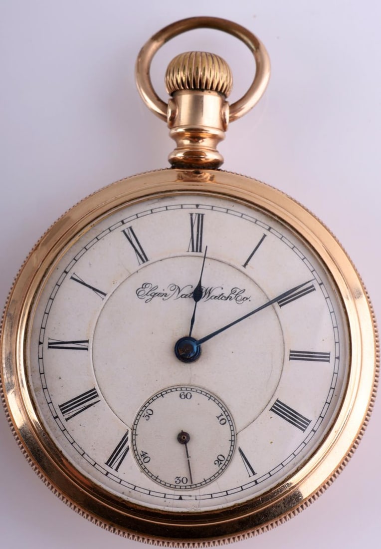 ELGIN WATCH CO GRADE 77 POCKET WATCH 14KT GOLD: 18s size pocket watch with 15 jewels. Movement serial number is 5058973. Marked Fahys 14k Monarch. Gold filled. Watch does not start and needs servicing. Very good condition otherwise.