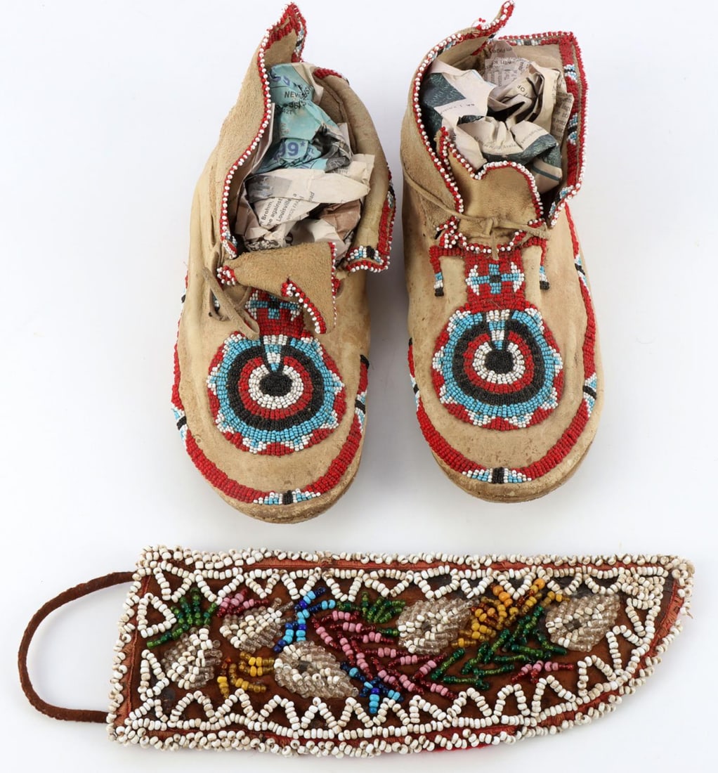 PLAINS INDIAN BEADED MOCCASINS & KNIFE SHEATH: Mid to early 20th century tribal items, sheath seems to be Bowie style 10 x 3 3/4 inches, moccasins are well crafted designed for wear with soles, the measure on bottom, 10 1/2 inches, geometric bead 