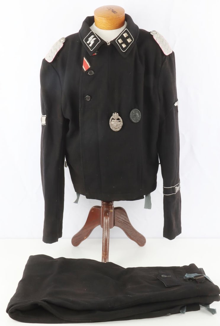 MUSEUM EXAMPLE WWII GERMAN WAFFEN SS PANZER TUNIC: WWII GERMAN WAFFEN SS PANZER TUNICAttributed to Albert Stuckler SS-Sturmbannfuhrer with the 2 SS-Panzer-Division 'Das Reich.' Black wool tunic with gray interior. SS-Sturmbannfuhrer collar tabs and sh
